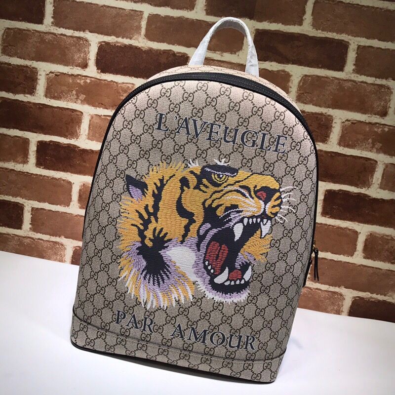 Gucci GG canvas and leather tiger head pattern backpack