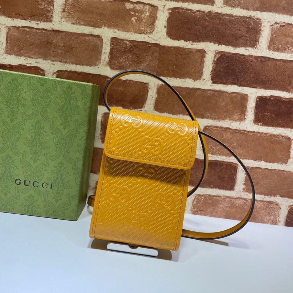 Gucci embossed mini bag with GG print