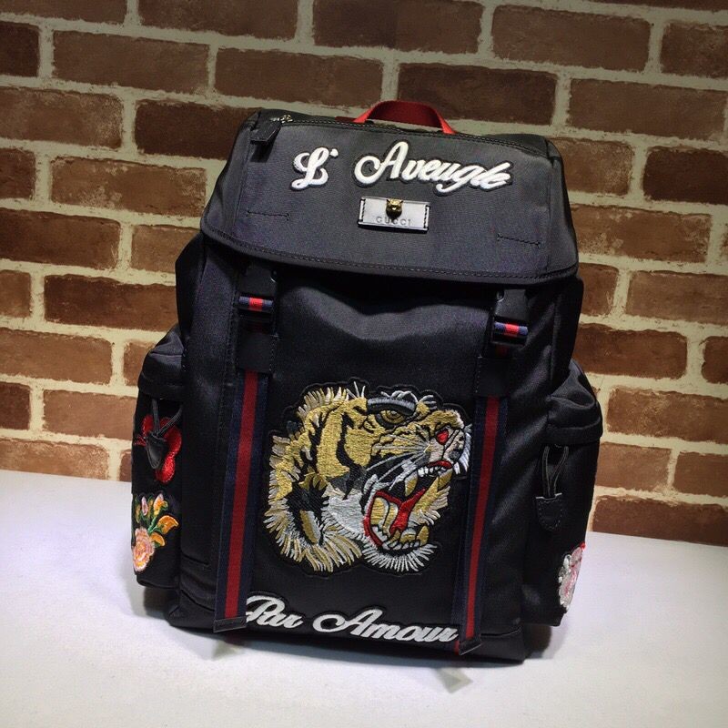 Gucci tiger embroidered backpack