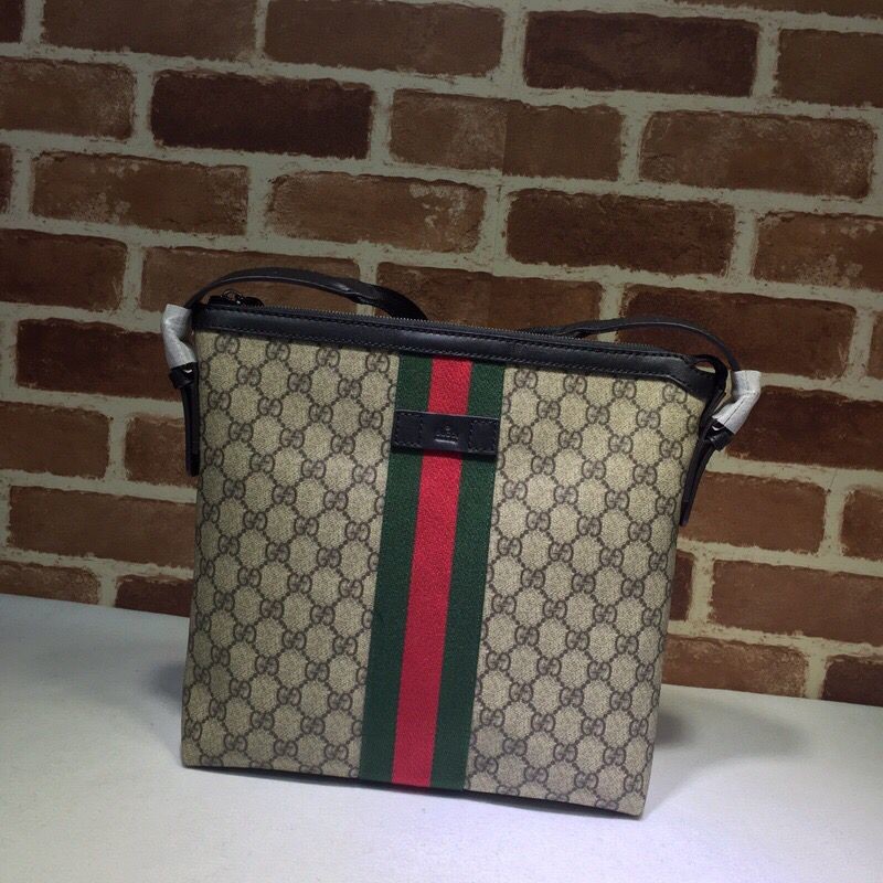 Gucci canvas messenger bag with striped webbing