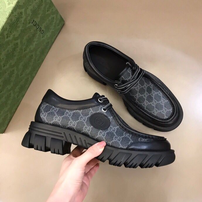 Gucci Men s black GG Supreme canvas GG loafers