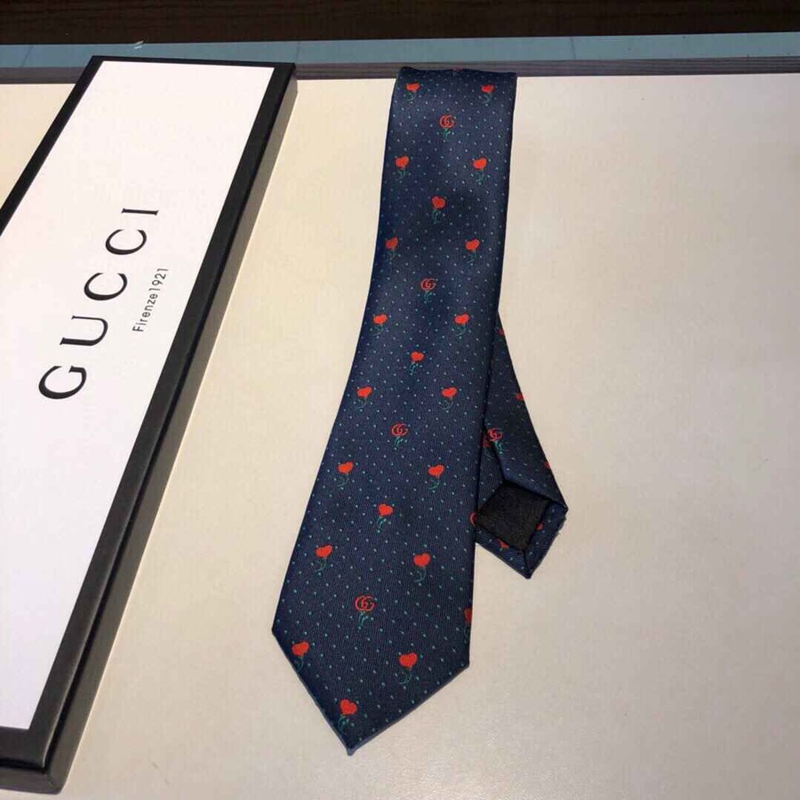 Gucci Silk tie with mini floral pattern