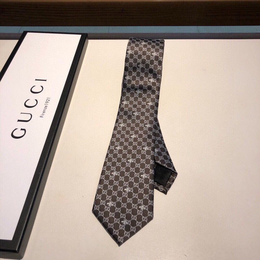 Gucci Woven bee embellished silk tie with interlocking G pattern